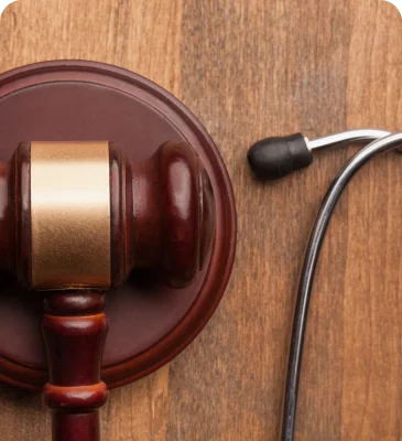 a gavel and a stethoscope