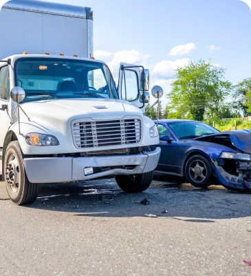 a white truck and a blue car