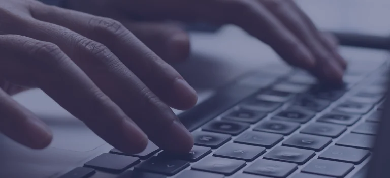 a close-up of a hand on a keyboard