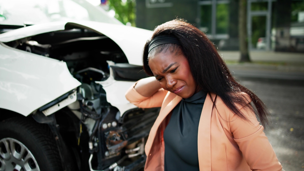 woman suffers neck pain after car accident
