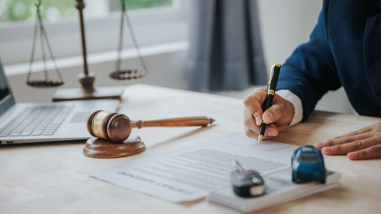 Judge male hand with car and documents