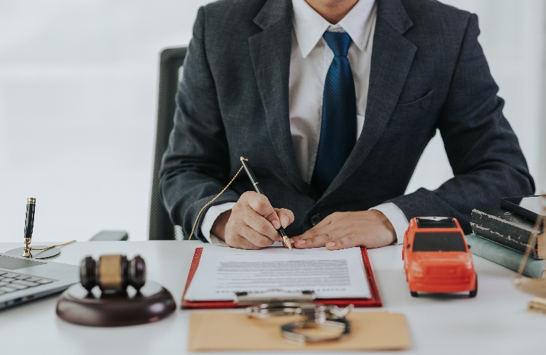 Judge male hand with car and documents