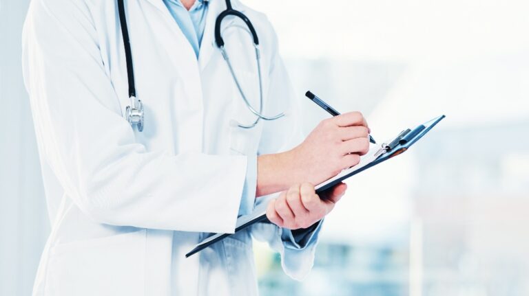 doctor writing on paper_S