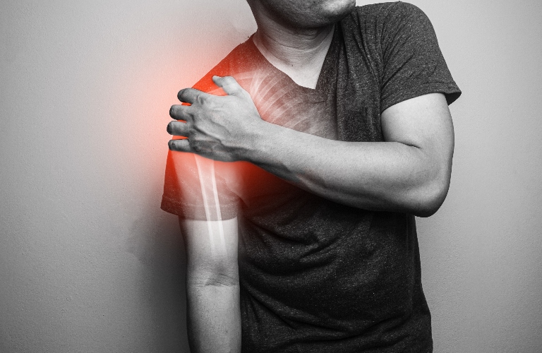 Male having shoulder pain