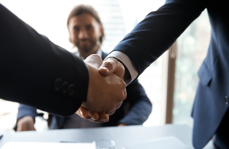 Attorney shaking a hand