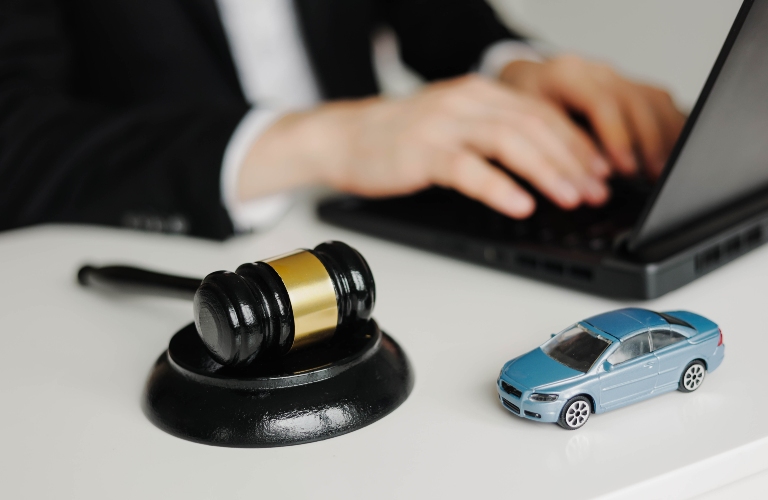 Car Accident Liability Insurance Lawyer And Gavel